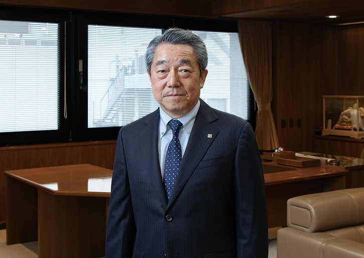 “President　Tsuneo Obuchi”